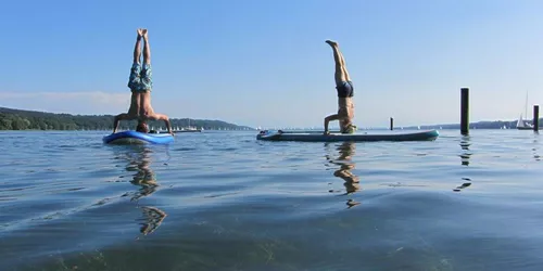 Stand-up yoga on Lake Starnberg or on the river Pegnitz